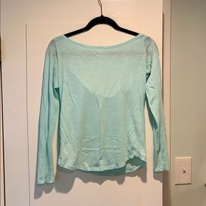 Teal scoop neck shirt with cut out back